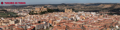 Fotografía panorámica de la ciudad de Alcañiz, con su castillo, la excolegiata y la Torre Gótica de la Concordia